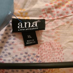 Sheer off white rainbow pocket dot design blouse